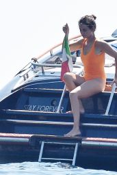 Penelope Cruz in Bright Orange Swimsuit on Board a Yacht in Portofino 07/30/2022