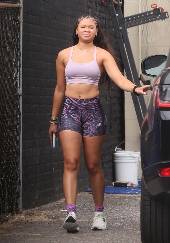 Storm Reid in a Purple Crop Top and Matching Legging Shorts in Los Angeles 08/22/2022