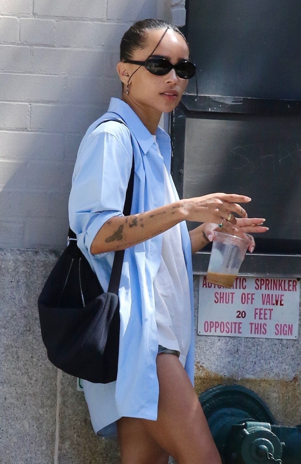 Zoe Kravitz in an Oversized Shirt, Shorts and Tassel Loafers - NYC 08 ...
