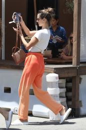 Alessandra Ambrosio in Orange Ombre Sweatpants and a Cropped White T-shirt 09/16/2022