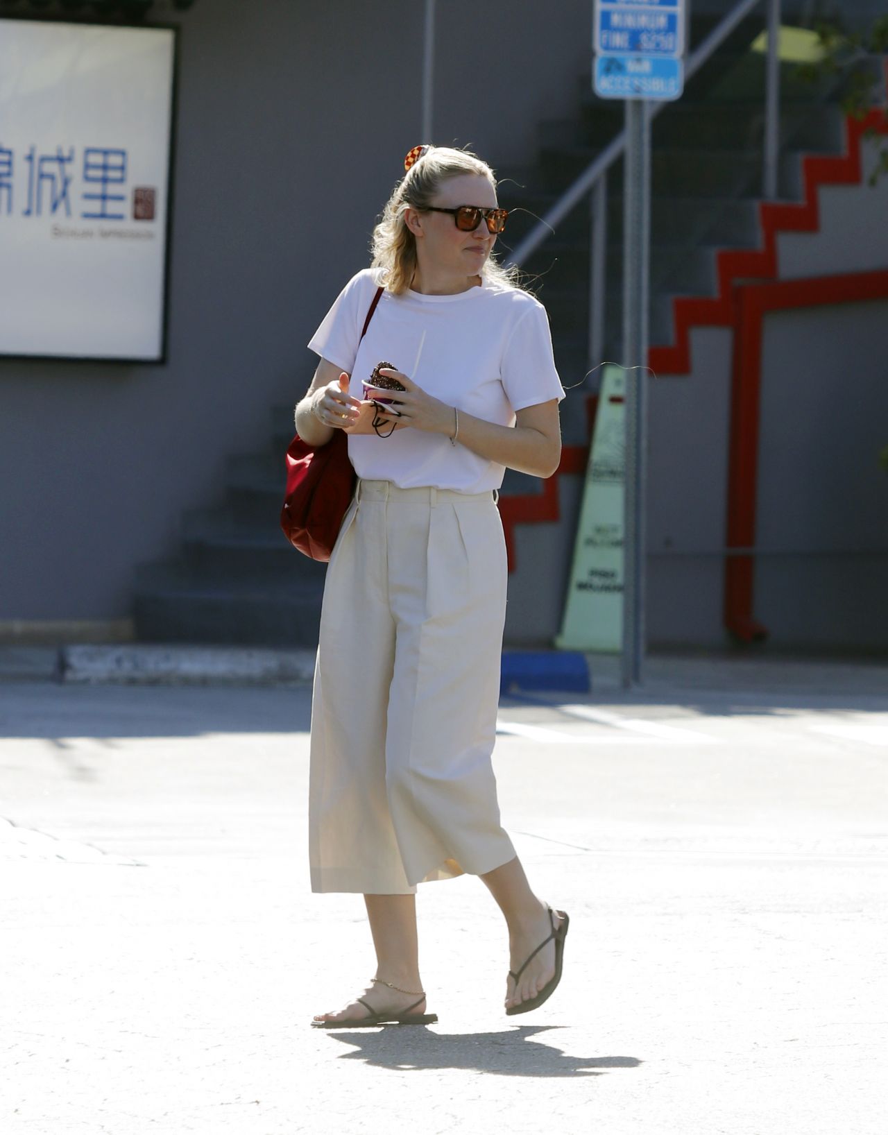 Dakota Fanning Carries Her Goyard Personalized Tote With Her Initials 07/25/ 2022 • CelebMafia