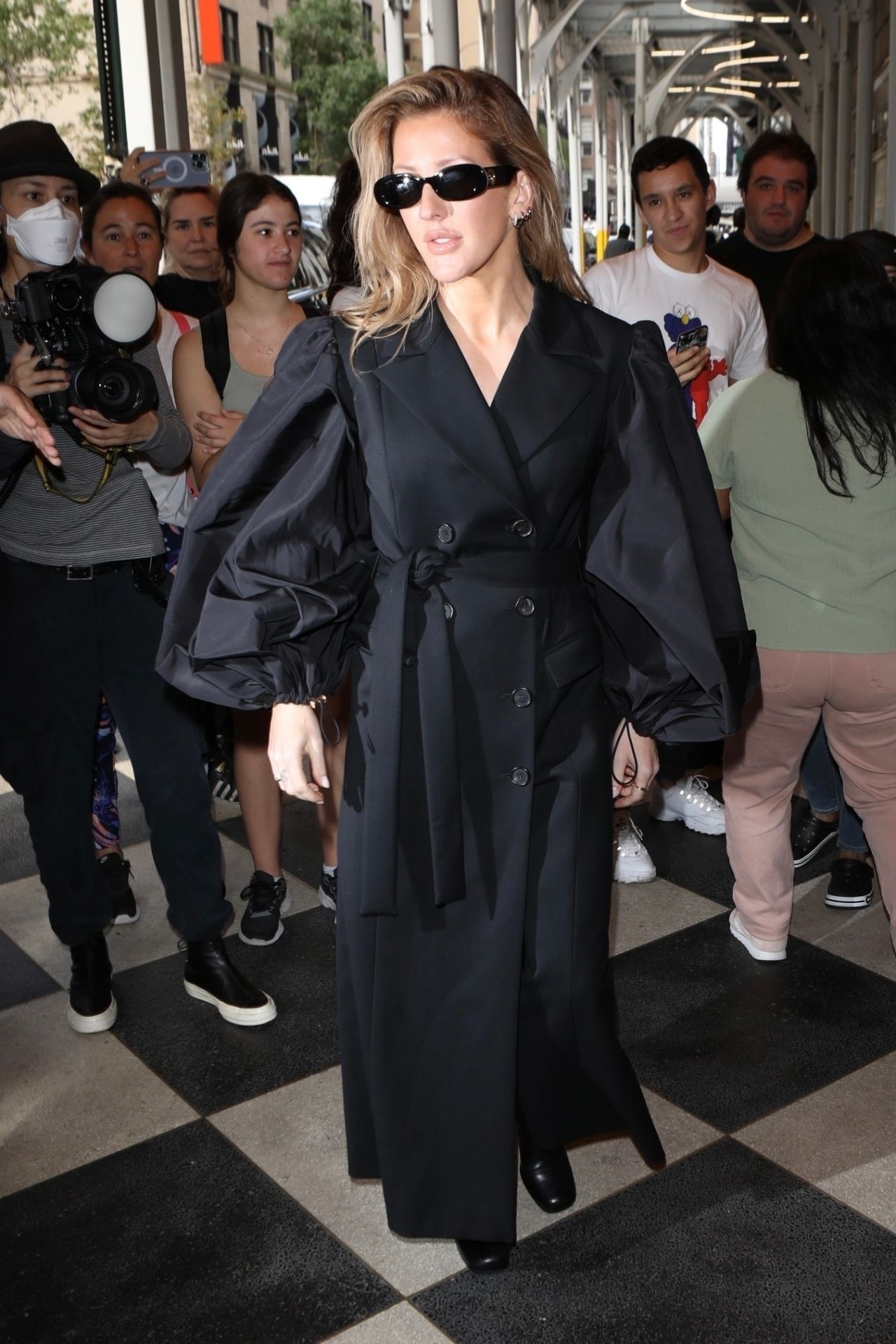 Ellie Goulding Wearing a Black Trench Coat and Black Leather Booties ...