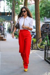 Emily Ratajkowski in a Pair of Red Pants and a Louis Vuitton Bag and Fendi Shades - New York 09/15/2022