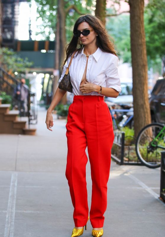 Emily Ratajkowski in a Pair of Red Pants and a Louis Vuitton Bag and ...
