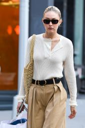 Gigi Hadid Wears Beige Slacks and a Cream Top - NY 09/09/2022