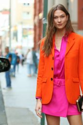 Karlie Kloss Wears a Pink Dress and Orange Jacket by Ami Paris   New York 09 15 2022   - 69