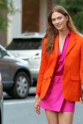 Karlie Kloss Wears a Pink Dress and Orange Jacket by Ami Paris - New York 09/15/2022