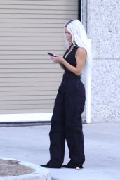 Kim Kardashian in a Plunging Bodysuit and Black Military Pants - Los Angeles 08/31/2022