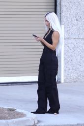 Kim Kardashian in a Plunging Bodysuit and Black Military Pants   Los Angeles 08 31 2022   - 52