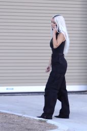 Kim Kardashian in a Plunging Bodysuit and Black Military Pants   Los Angeles 08 31 2022   - 14