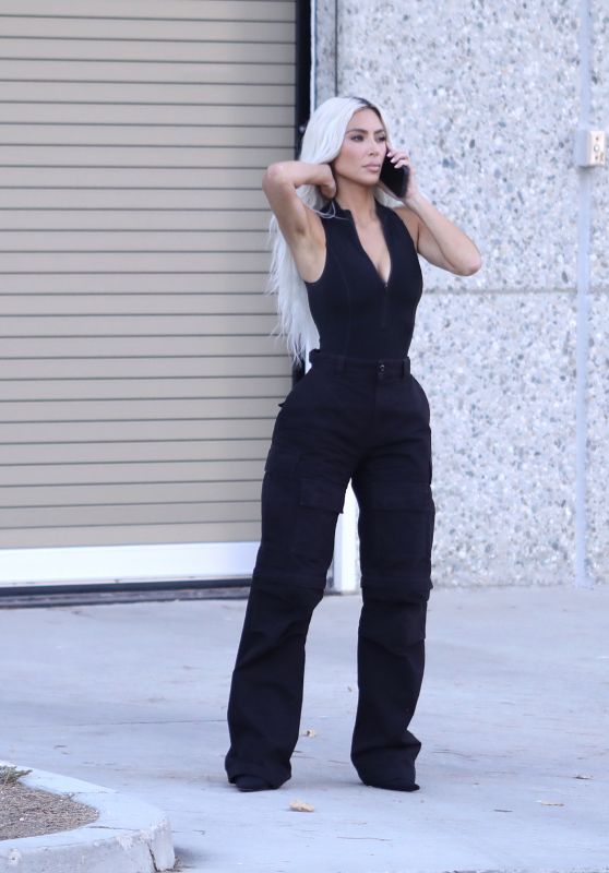 Kim Kardashian in a Plunging Bodysuit and Black Military Pants - Los Angeles 08/31/2022