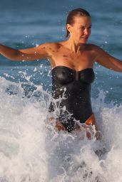 Lara Bingle in a Black Swimsuit in Sydney 09/25/2022