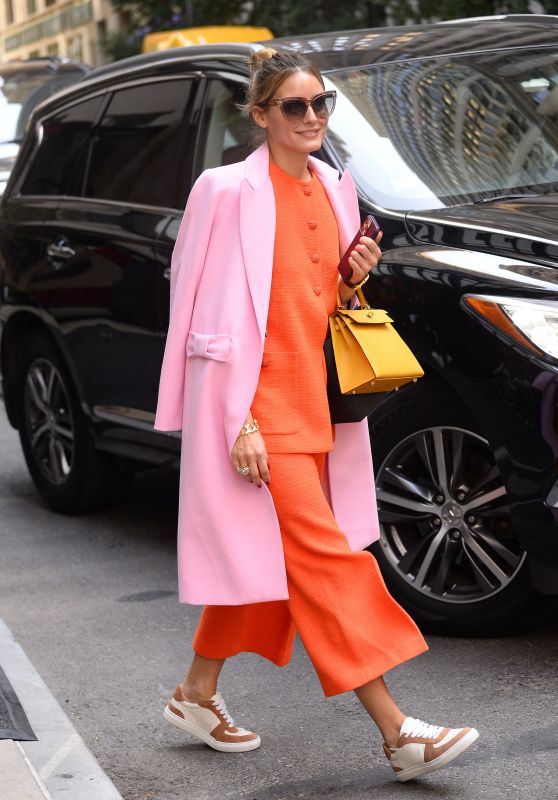 Olivia Palermo Wearing an Orange Suit Dress, Pink Fall Jacket and Yellow Handbag - NYC 09/17/2022