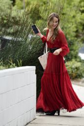 Olivia Wilde in a Semi Sheer Red Dior Tulle Dress and Black Heels in Los Angeles 09/10/2022