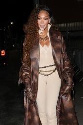 Winnie Harlow Wearing a Brown Leather Coat and Beige Jumpsuit - Whiz Kidd Apple Music Concert in London 09/27/2022