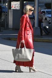 Anna Wintour Wearing a Maxi Red Leather Coat and Snakeskin Boots - New York 10/10/2022