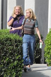 Brie Larson in a Sweater Vest and Blue Jeans - Leaves the Set of "Lessons in Chemistry" in LA 10/19/2022