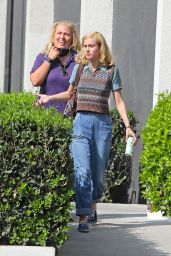 Brie Larson in a Sweater Vest and Blue Jeans - Leaves the Set of "Lessons in Chemistry" in LA 10/19/2022
