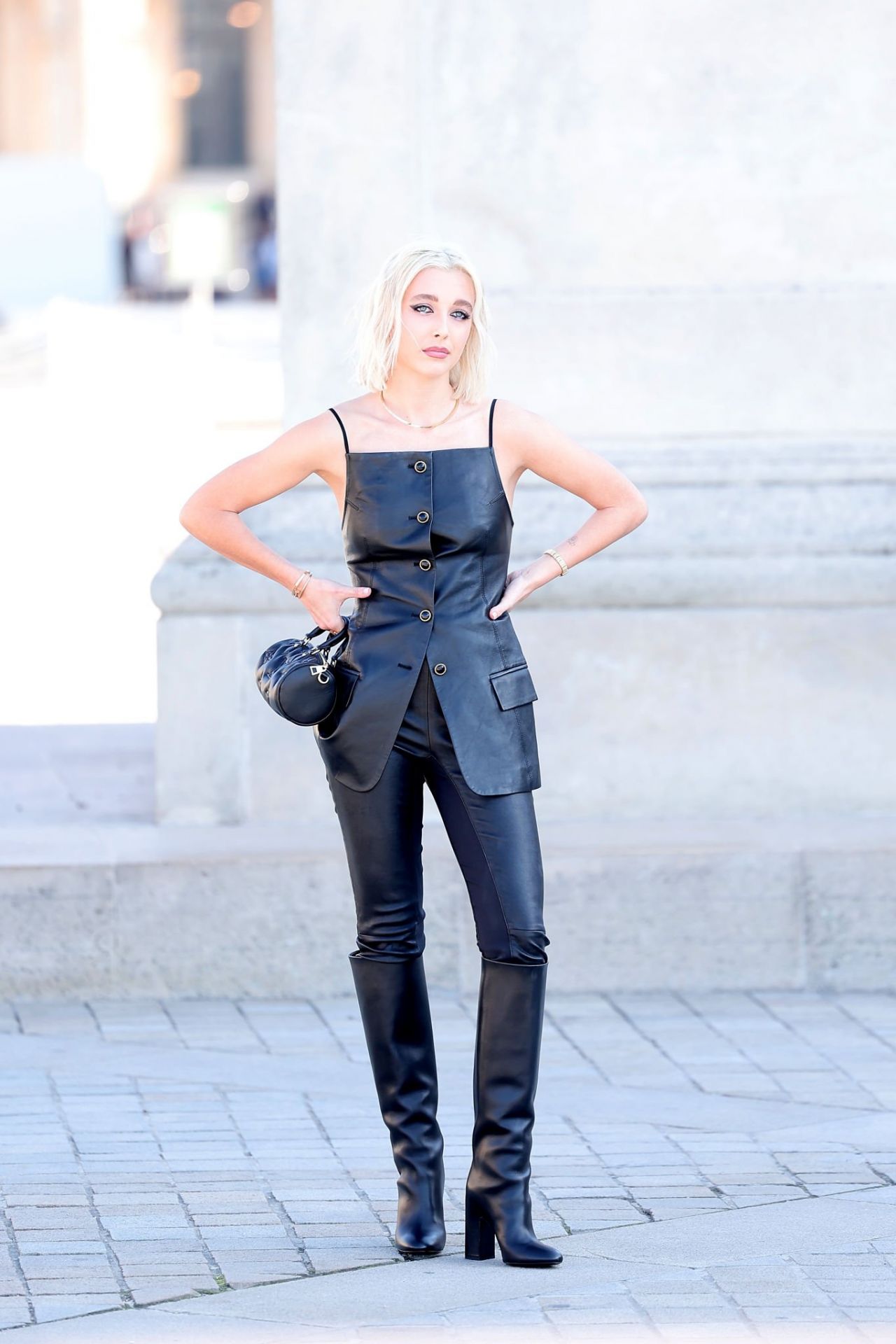 Emma Chamberlain Reps Louis Vuitton In Mini Skirt And Black Boots –  Footwear News