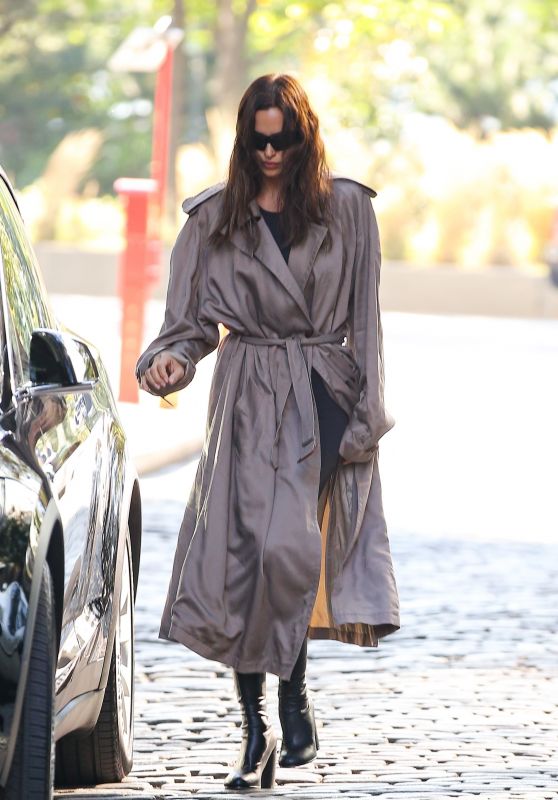 Irina Shayk in a Trench Coat and Black Leather Toe Over-the-knee Boots - New York 10/21/2022