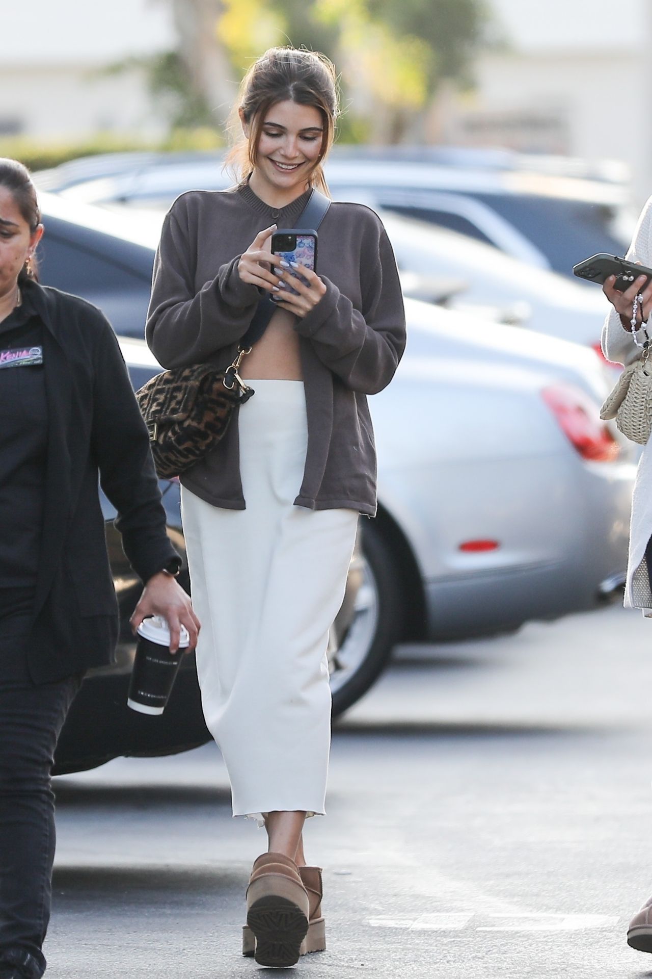 Olivia Jade Giannulli Wears a White Skirt and a Brown Jacket - Shopping ...