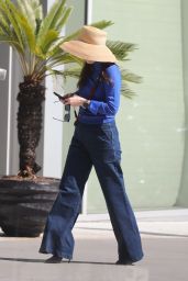 Zoey Deschanel Wears Bell Bottom Jeans and a Straw Hat at the Proper Hotel in Santa Monica 10 22 2022   - 20