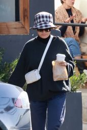 Alia Shawkat in a Plaid Bucket Hat, Ribbed Sweater and Track Pants - Los Angeles 11/04/2022