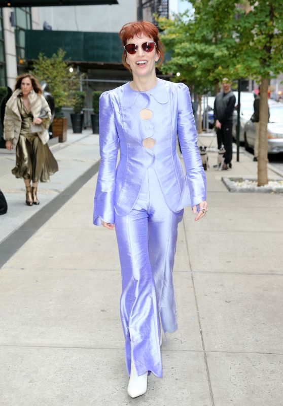 Britt Lower Wears a Purple Pants Suit and White Boots - New York 11/13/2022