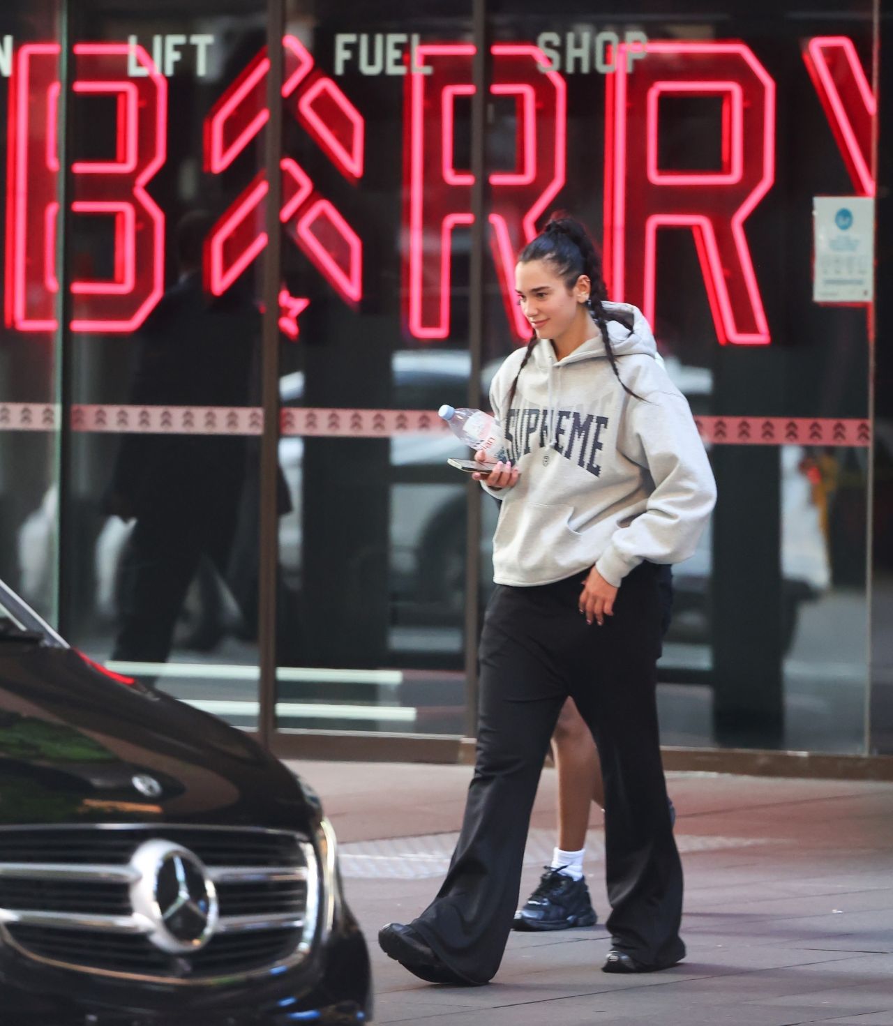 Dua Lipa Wears a Baggy Supreme Hoodie in Sydney 11/07/2022 • CelebMafia