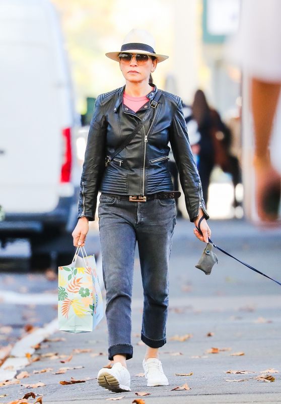 Julianna Margulies in a Leather Jacket and Fedora Hat - Shopping in Manhattan’s SoHo Area 11/04/2022