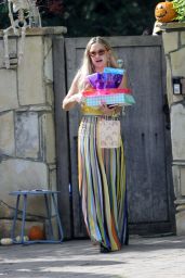 Kate Hudson in a Colorful Long Striped Skirt and a Yellow Top   Brentwood 10 31 2022   - 52