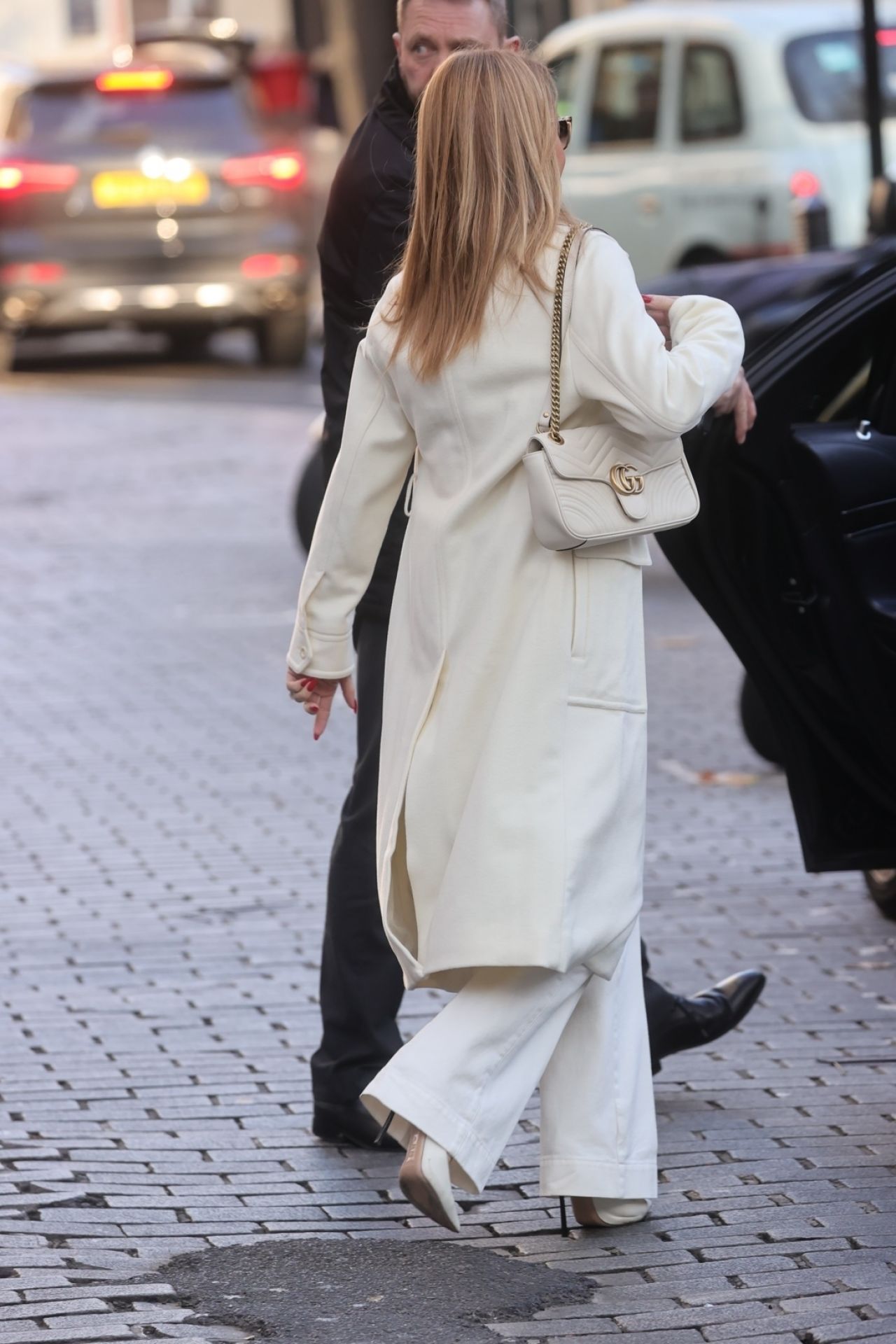 Amanda Holden in a Long Cream Coat and a Knitted Turtleneck Jumper 12