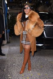 Ashanti Wears a Plaid Mini Dress Under a Brown Fur Coat and Matching Boots - New York 12/13/2022