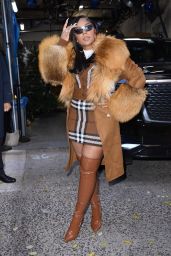 Ashanti Wears a Plaid Mini Dress Under a Brown Fur Coat and Matching Boots - New York 12/13/2022