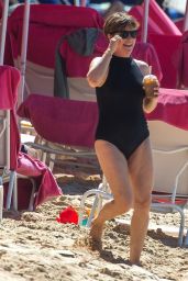 Emma Forbes in a Black Swimsuit in Barbados 12/22/2022