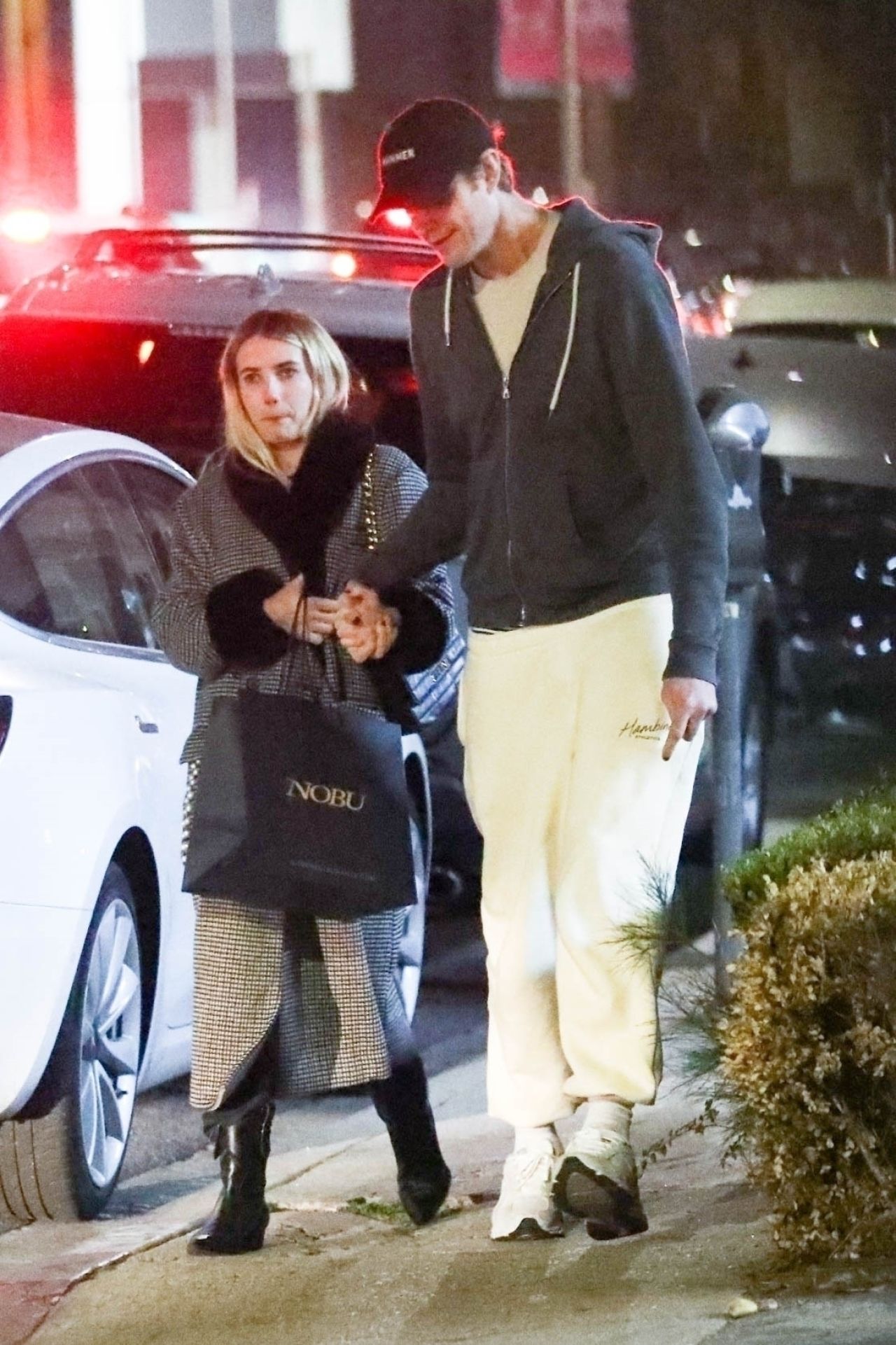 Emma Roberts and Cody John at Nobu Restaurant in Los Angeles 12/17/2022 ...