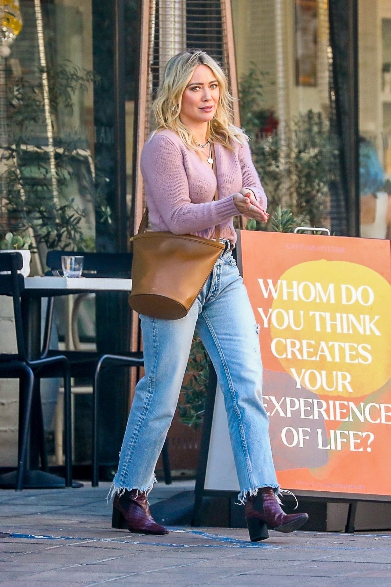 Hilary Duff cute in pink sweater and jeans out in LA