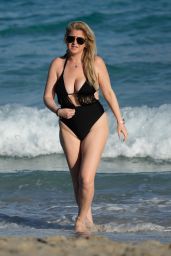 Josie Goldberg in a Black Swimsuit at the Beach in Miami 12/27/2022
