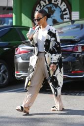 Karrueche Tran in a Pair of Cozy Sweatpants and Cropped White Top   West Hollywood 12 07 2022   - 12