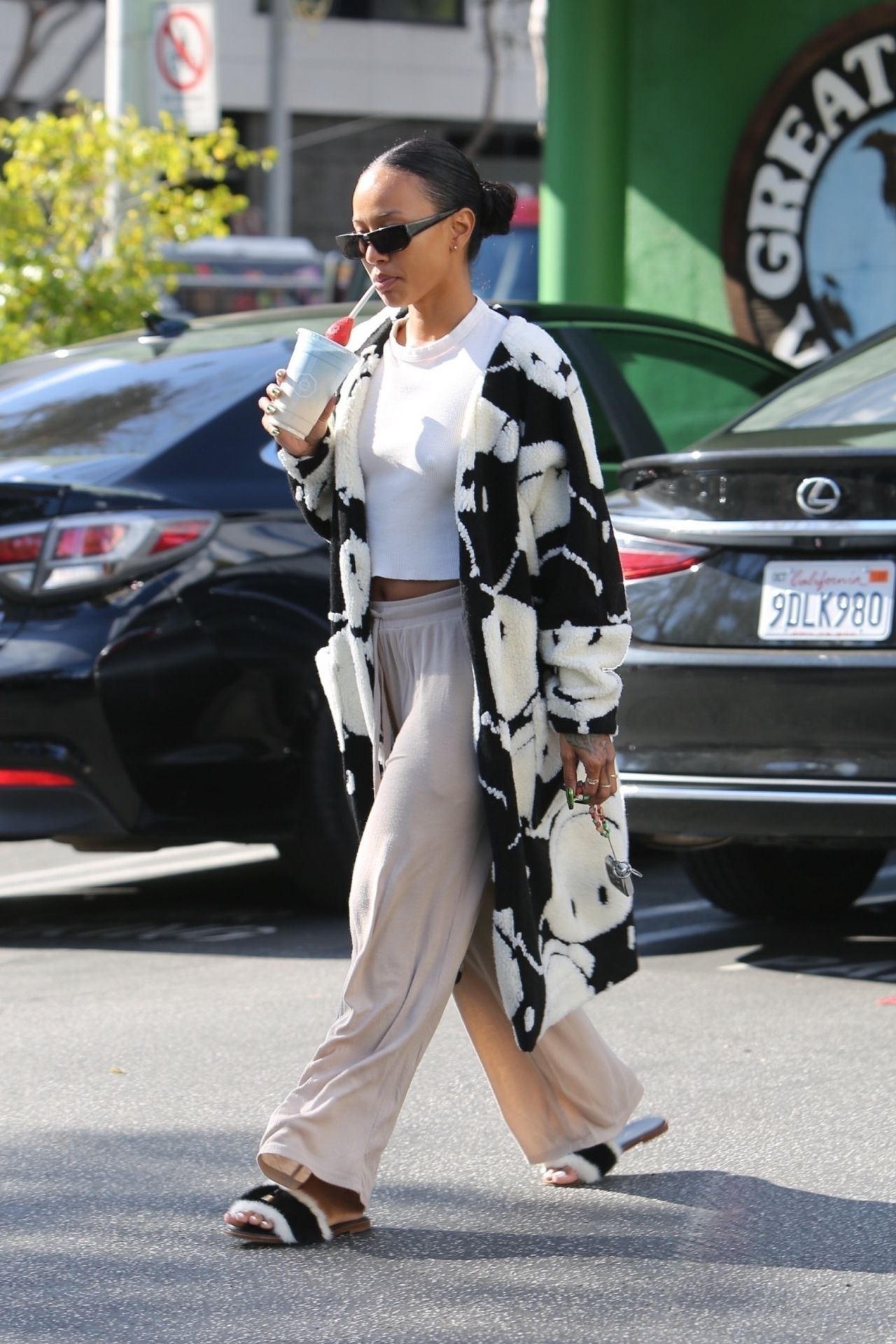 Karrueche Tran in a Pair of Cozy Sweatpants and Cropped White Top ...