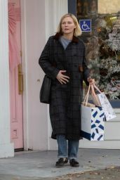 Kirsten Dunst Wears a Stylish Dark Overcoat and Leather Flats - Christmas Shopping in Studio City 12/19/2022