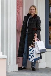 Kirsten Dunst Wears a Stylish Dark Overcoat and Leather Flats - Christmas Shopping in Studio City 12/19/2022