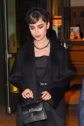 Lily Collins Wearing a Black Dress and Trench Coat   New York 12 12 2022   - 7