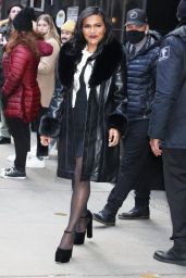 Mindy Kaling Wears a Leather Fur Coat and Tie-mini Skirt Dress at GMA in New York 12/01/2022