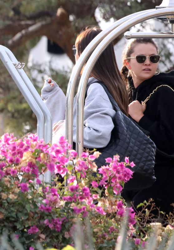 Nicola Peltz and Selena Gomez at a Private Airport in Los Cabos 12/29/2022
