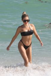 Sylvie Meis in Asymettrical Black Bikini - Beach in Miami Beach 11/30/2022