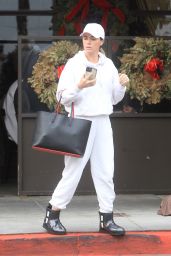 Teddi Mellencamp Wearing a White Sweatsuit and Black Ugg Boots 12/15/2022