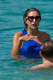 Zara McDermott in a Blue Swimsuit in Barbados 12/21/2022