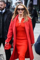 Amanda Holden in a Slim-fit Red Pencil Dress and Coordinating Long-line Coat in London 01/09/2023