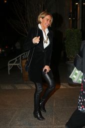 Arielle Kebbel in Black Overcoat and YSL Bag in New York 01/17/2023